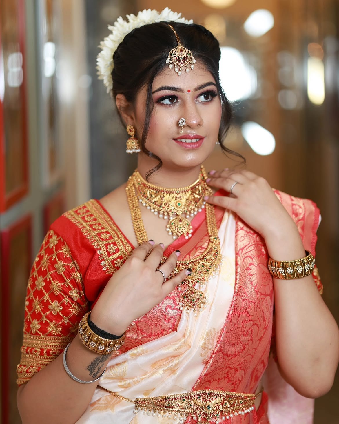 Bride wearing traditional gold jewellery
