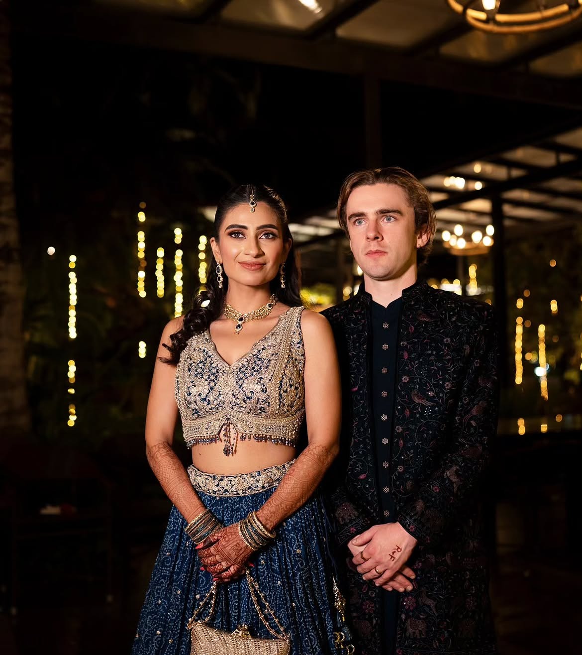 Couple dressed for their evening reception